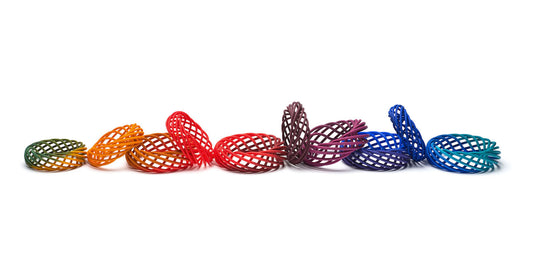 collection of Vortex bangles in colour wheel gradient