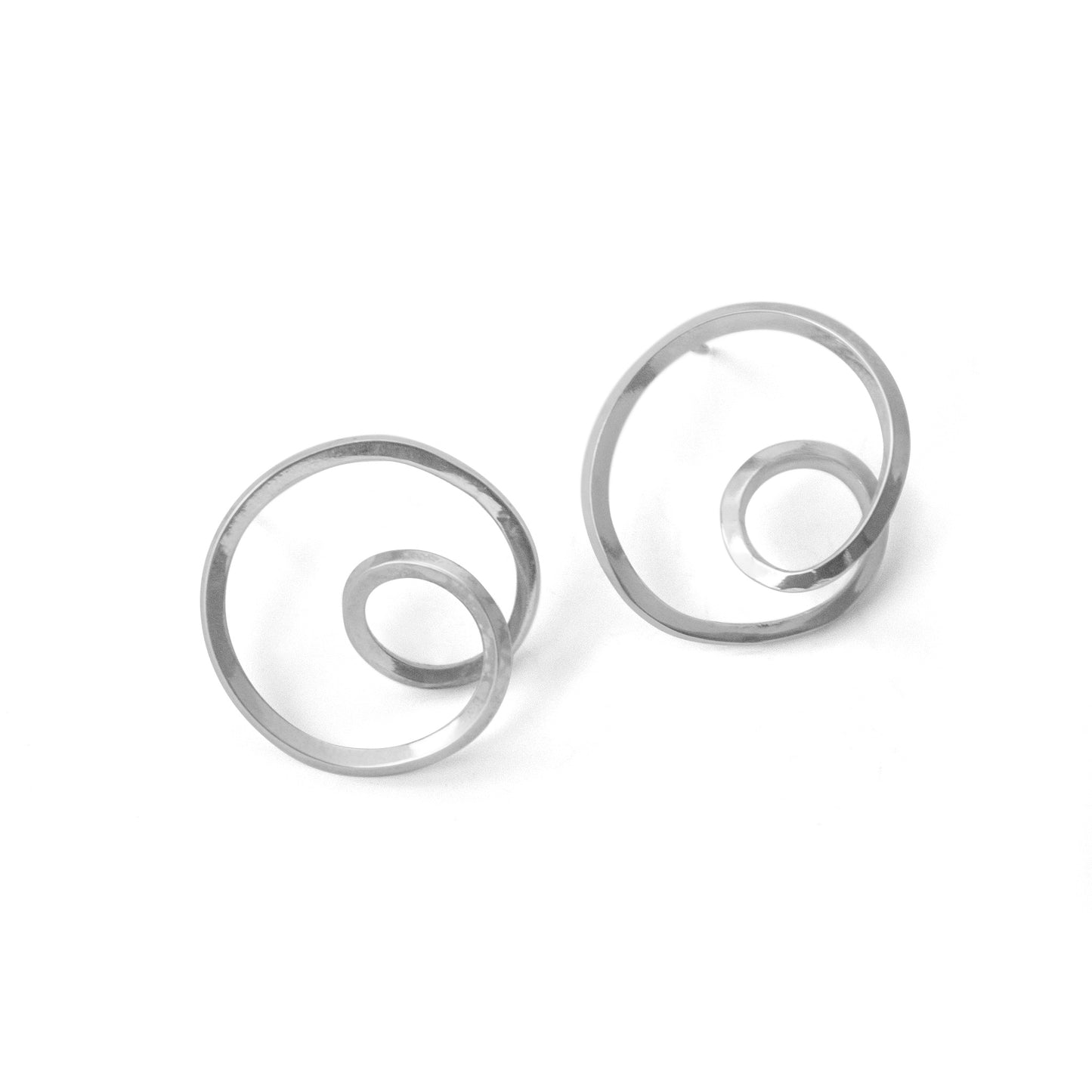 A double twist of silver creates an elegant stud earring.