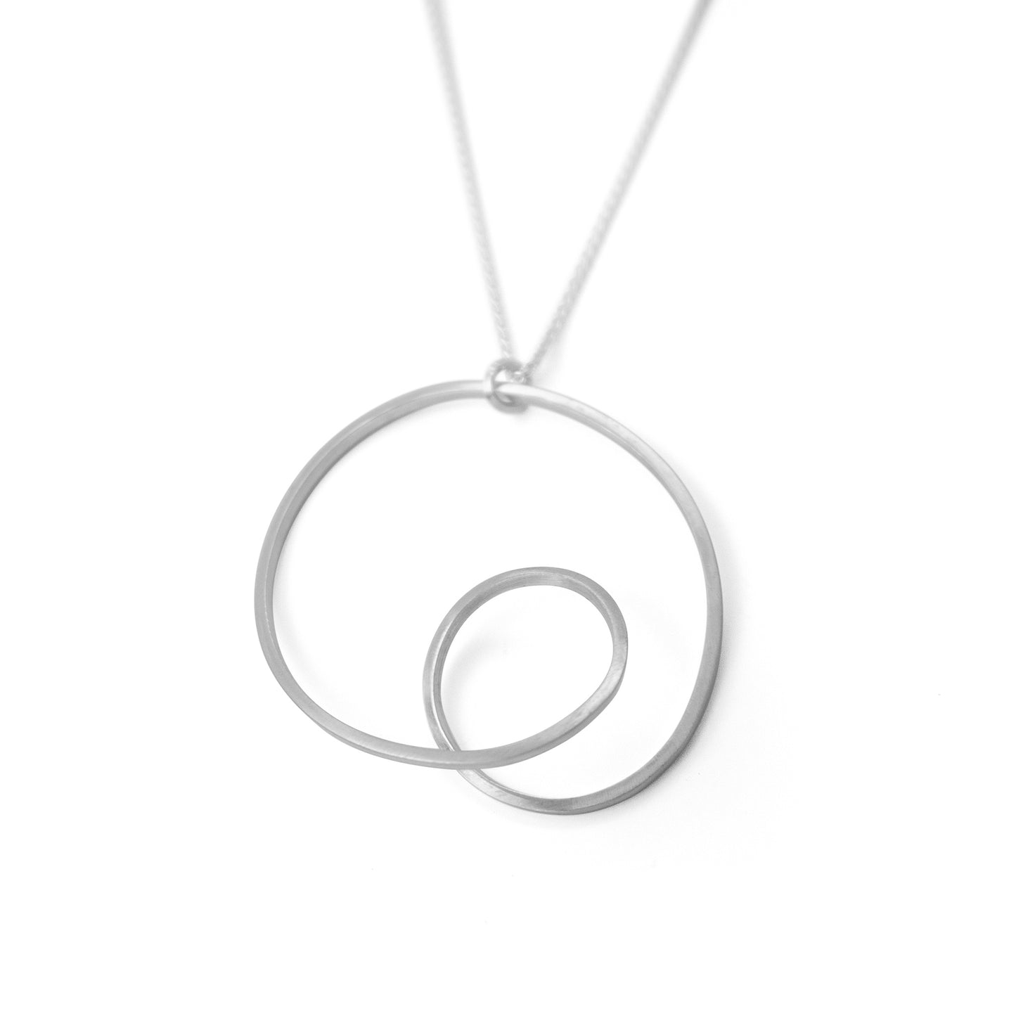 Silver Looped pendant on long chain