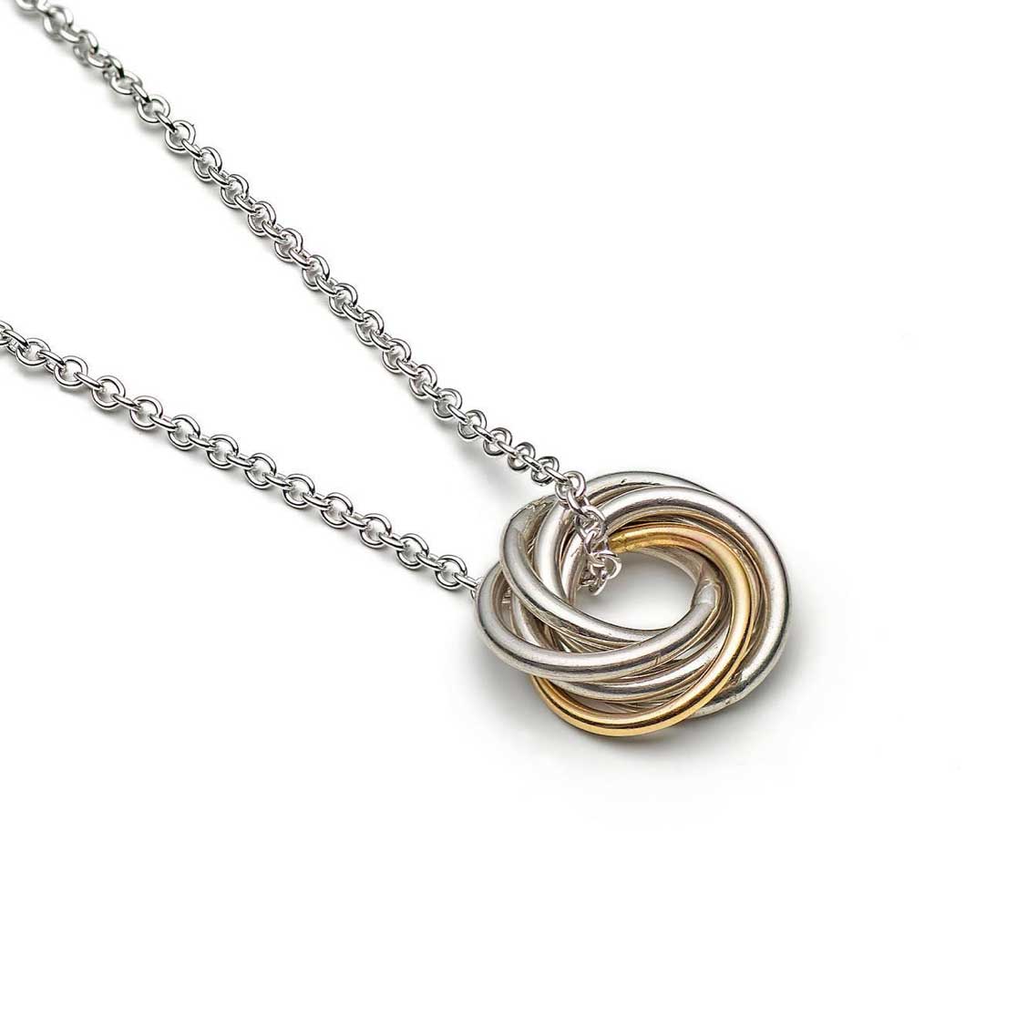 Small Interlocking Silver and Gold Pendant