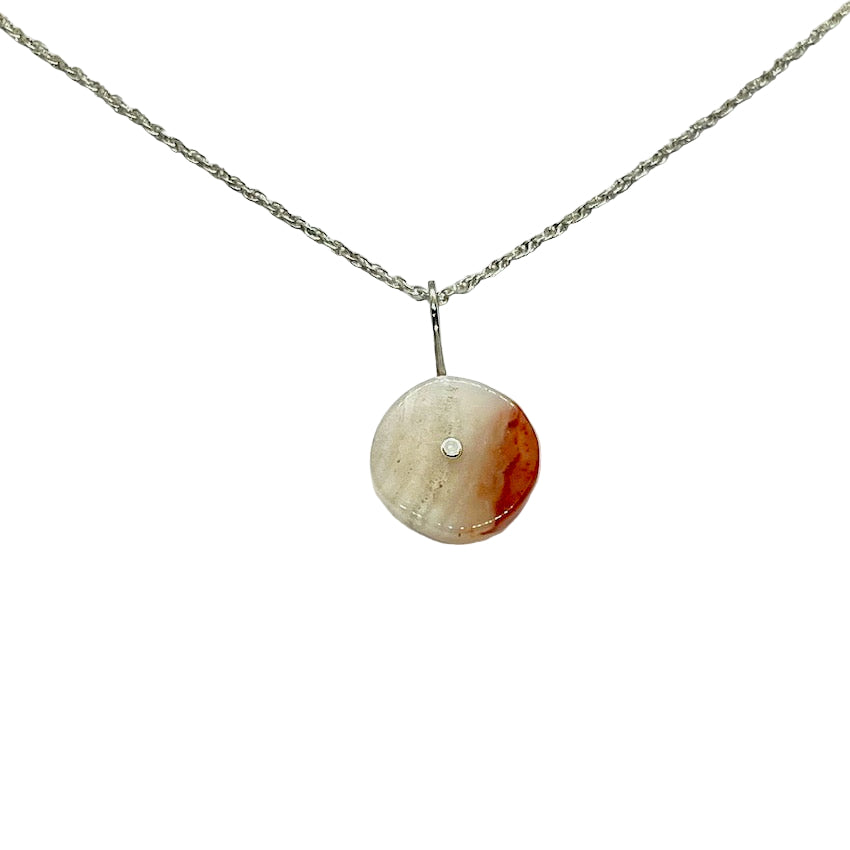 cornish agate pendant on a white back ground
