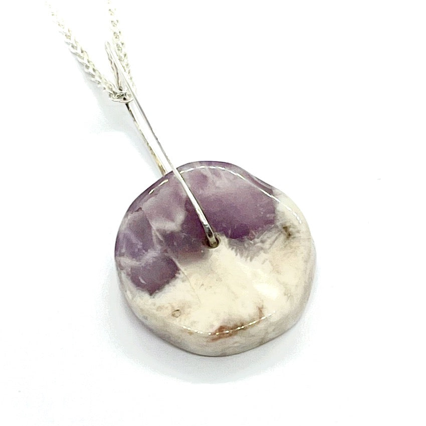 Amethyst quartz pendant held on sterling silver
