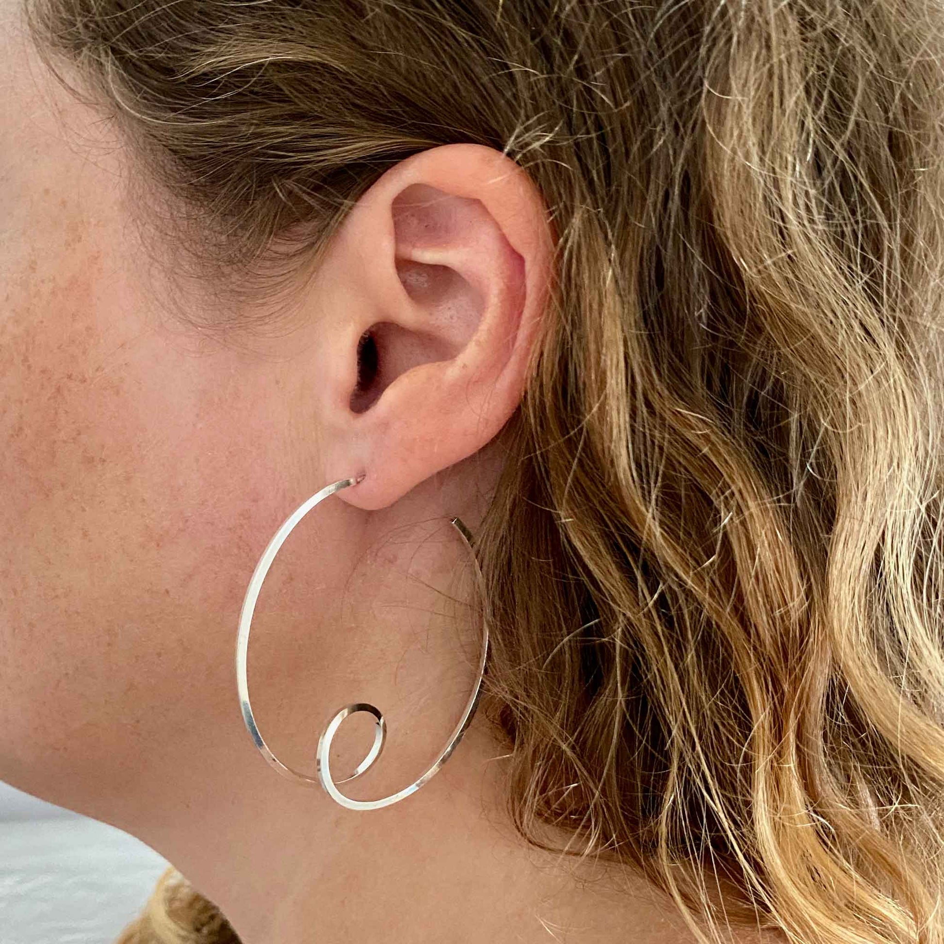 6cm statement Hoop earrings on the ear.