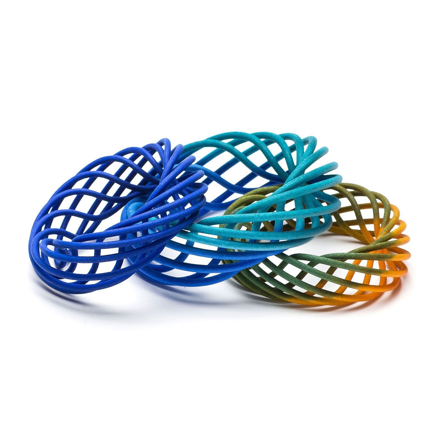 Colourful stack of vortex 3D printed nylon bangles