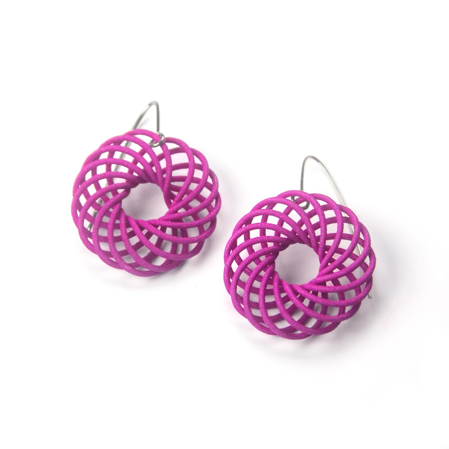 Small pink Vortex 3D printed nylon earrings by Katy Luxton